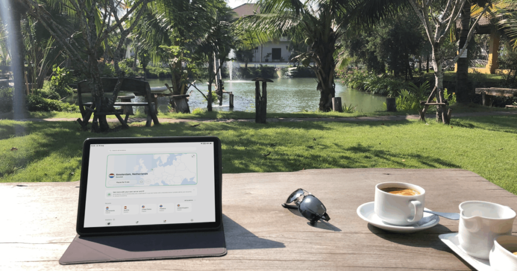 Digital comfort in Thailand with a comfort-seeking traveller using a tablet to stream European television safely on a secure internet connection at a luxury resort in the Isaan region.
