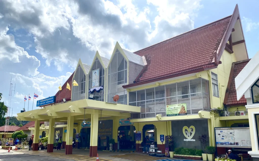 The traditional architecture of Ubon Ratchathani railway station building with a yellow facade.