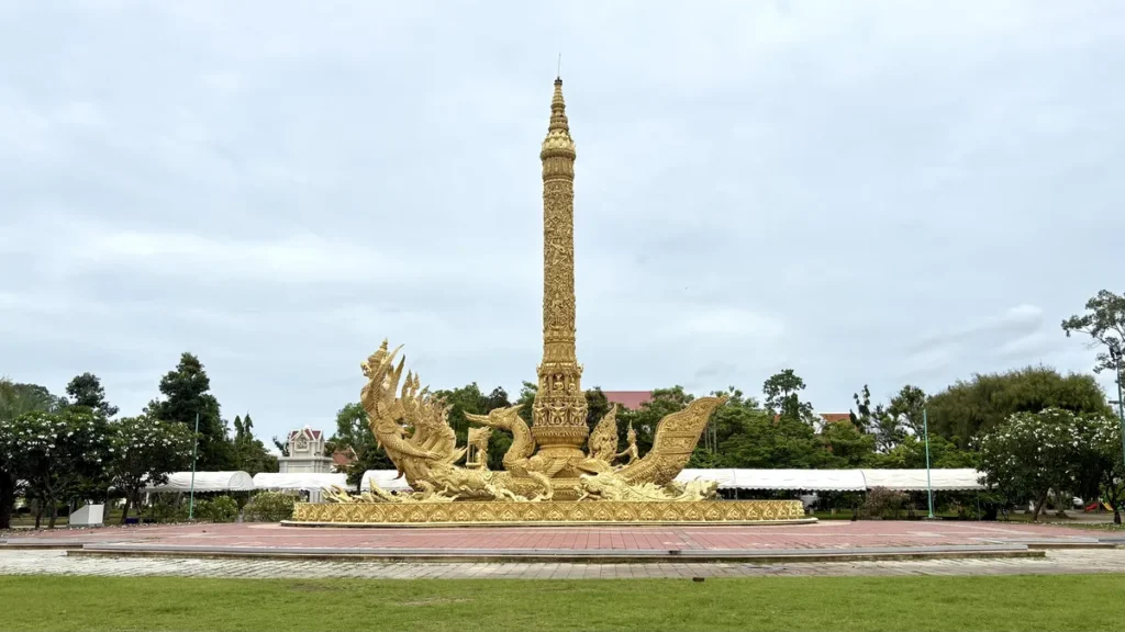 The massive golden Candle Festival Monument at Thung Si Mueang Park in Ubon Ratchathani.